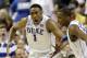 Duke's Jabari Parker, left, reacts with teammate Rasheed Sulaimon, right, after a basket against North Carolina State during the second half of an NCAA college basketball game in the semifinals of the Atlantic Coast Conference tournament in Greensboro, N.C., Saturday, March 15, 2014. (AP Photo/Gerry Broome)