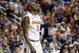 Syracuse's Jerami Grant (3) walks off the court after their loss to North Carolina State in a quarterfinal NCAA college basketball game at the Atlantic Coast Conference tournament in Greensboro, N.C., Friday, March 14, 2014. North Carolina State won 66-63. (AP Photo/Gerry Broome)