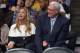 Jeanie Buss, left, Los Angeles Lakers executive vice president of business operations, and former Lakers head coach Phil Jackson sit during the first half of their NBA basketball game against the Dallas Mavericks, Tuesday, April 2, 2013, in Los Angeles. (AP Photo/Mark J. Terrill)