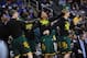 Mar 14, 2014; Kansas City, MO, USA; Baylor Bears players celebrate as they watch a replay during the first half against the Texas Longhorns in the semifinals of the Big 12 Conference college basketball tournament at Sprint Center. Mandatory Credit: Denny Medley-USA TODAY Sports