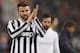 Juventus' Andrea Barzagli salutes supporters during an Italian Cup, round of eight, soccer match, between AS Roma and Juventus at Rome's Olympic stadium, Tuesday, Jan. 21, 2014. (AP Photo/Alessandra Tarantino)