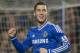 Chelsea's Eden Hazard celebrates after scoring against Tottenham Hotspur during their English Premier League soccer match, at the Stamford Bridge Stadium in London, Saturday March 8, 2014. (AP Photo/Bogdan Maran)