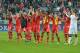 Bayern's players celebrate with supporters after the Champions League round of the last 16 second leg soccer match between FC Bayern Munich and Arsenal FC in Munich, Germany, on Tuesday, March 11. 2014. The match finished 1:1. (AP Photo/Kerstin Joensson)