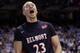 Belmont's Craig Bradshaw (23) reacts following a basket against North Carolina during the second half of an NCAA college basketball game in Chapel Hill, N.C., Sunday, Nov. 17, 2013. Belmont won 83-80. North Carolina's James Michael McAdoo walks away at rear. (AP Photo/Gerry Broome)