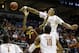 MILWAUKEE, WI - MARCH 20: Cameron Ridley #55 of the Texas Longhorns blokcs a shot by Jahii Carson #1 of the Arizona State Sun Devils in the second half during the second round of the 2014 NCAA Men's Basketball Tournament at BMO Harris Bradley Center on March 20, 2014 in Milwaukee, Wisconsin. (Photo by Mike McGinnis/Getty Images)