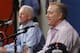Denver Broncos Vice President John Elway, right, speaks during an end of the season news conference at the NFL football team's headquarters in Englewood, Colo., on Tuesday, Feb. 4, 2014. Head coach John Fox listens at left. (AP Photo/Ed Andrieski)