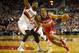 Mar 20, 2014; Portland, OR, USA; Washington Wizards guard Andre Miller (24) dribbles the ball as Washington Wizards guard Andre Miller (24) defends at Moda Center. Mandatory Credit: Jaime Valdez-USA TODAY Sports