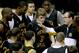 Wichita State coach Gregg Marshall, right, talks to his players during practice for the NCAA college basketball tournament Thursday, March 20, 2014, in St. Louis. Wichita State is scheduled to play against Cal Poly in a second-round game on Friday. (AP Photo/Charlie Riedel)
