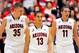 Feb 9, 2014; Tucson, AZ, USA; Arizona Wildcats center Kaleb Tarczewski (35) guard Nick Johnson (13) and forward Aaron Gordon (11) walk on the court during the first half against the Oregon State Beavers at McKale Center. Arizona won 76-54. Mandatory Credit: Casey Sapio-USA TODAY Sports