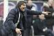 Juventus coach Antonio Conte calls out to his players during the Serie A soccer match between AC Milan and Juventus at the San Siro stadium in Milan, Italy, Sunday, March 2, 2014. (AP Photo/Antonio Calanni)
