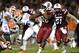 South Carolina running back Mike Davis (28) rushes past Florida's Brian Poole (24) during the first half of an NCAA college football game Saturday, Nov. 16, 2013, at Williams-Brice Stadium in Columbia, S.C. South Carolina won 19-14. (AP Photo/ Richard Shiro)