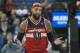 Mar 18, 2014; Sacramento, CA, USA; Washington Wizards forward Drew Gooden (90) reacts after scoring a basket against the Sacramento Kings during the fourth quarter at Sleep Train Arena. The Sacramento Kings defeated the Washington Wizards 117-111 in overtime. Mandatory Credit: Ed Szczepanski-USA TODAY Sports