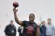 Louisville quarterback Teddy Bridgewater participates in a passing drill for NFL representatives during pro day at the University of Louisville in Louisville, Ky., Monday, March 17, 2014. (AP Photo/Timothy D. Easley)