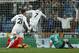 Real's Cristiano Ronaldo, center, scores his goal during a Champions League round of 16 second leg soccer match between Real Madrid and FC Schalke 04 at the Santiago Bernabeu stadium in Madrid, Tuesday, March 18, 2014. (AP Photo/Andres Kudacki)