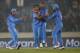 India's Bhuvneshwar Kumar, second left, celebrates with teammates the dismissal of Pakistan's batsman Kamran Akmal during their ICC Twenty20 Cricket World Cup match in Dhaka, Bangladesh, Friday, March 21, 2014. (AP Photo/Aijaz Rahi)