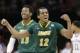 North Dakota State's Lawrence Alexander (12) celebrates in overtime during a second-round game against Oklahoma in the NCAA men's college basketball tournament in Spokane, Wash., Thursday, March 20, 2014. North Dakota State won 80-75. (AP Photo/Elaine Thompson)