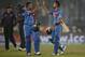 India's batsmen Suresh Raina, second right, and Virat Kohli, right, celebrate their victory over Pakistan in the ICC Twenty20 Cricket World Cup match in Dhaka, Bangladesh, Friday, March 21, 2014. (AP Photo/Aijaz Rahi)