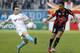 Marseille's French midfielder Mathieu Valbuena, left, challenges for the ball with Nice's French defender Timothee Kolodziejczak , during their League One soccer match, in Marseille, southern France, Sunday, Nov. 11, 2012. (AP Photo/Claude Paris)