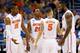 ORLANDO, FL - MARCH 20: (L-R) Will Yeguete #15, Michael Frazier II #20, Scottie Wilbekin #5 and Patric Young #4 of the Florida Gators talk in the second half against the Albany Great Danes during the second round of the 2014 NCAA Men's Basketball Tournament at Amway Center on March 20, 2014 in Orlando, Florida. (Photo by Kevin C. Cox/Getty Images)