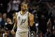 Dec 29, 2013; San Antonio, TX, USA; San Antonio Spurs guard Tony Parker (9) reacts after a shot during the second half against the Sacramento Kings at the AT&T Center. The Spurs won 112-104. Mandatory Credit: Soobum Im-USA TODAY Sports