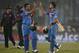 India's batsmen Suresh Raina, second right, and Virat Kohli, right, celebrate their victory over Pakistan in the ICC Twenty20 Cricket World Cup match in Dhaka, Bangladesh, Friday, March 21, 2014. (AP Photo/Aijaz Rahi)