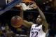 Kansas' Andrew Wiggins dunks the ball during the second half of a second-round game against Eastern Kentucky in the NCAA college basketball tournament Friday, March 21, 2014, in St. Louis. Kansas won 80-69. (AP Photo/Jeff Roberson)