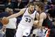 Memphis Grizzlies center Marc Gasol (33), of Spain, drives against Portland Trail Blazers center Robin Lopez in the first half of an NBA basketball game on Tuesday, March 11, 2014, in Memphis, Tenn. (AP Photo/Mark Humphrey)