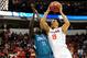 RALEIGH, NC - MARCH 21: Anthony Gill #13 of the Virginia Cavaliers goes up against El Hadji Ndieguene #11 of the Coastal Carolina Chanticleers in the first half during the Second Round of the 2014 NCAA Basketball Tournament at PNC Arena on March 21, 2014 in Raleigh, North Carolina. (Photo by Grant Halverson/Getty Images)