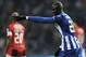 FC Porto's Eliaquim Mangala, from France, celebrates after scoring the opening goal against Olhanense in a Portuguese League soccer match at the Dragao Stadium in Porto, Portugal, Friday, Dec. 20, 2013. (AP Photo/Paulo Duarte)