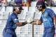 Sri Lanka's Kumar Sangakkara, right, congratulates teammate Kusal Perera for scoring fifty runs during the ICC Twenty20 Cricket World Cup match against South Africa in Chittagong, Bangladesh, Saturday, March 22, 2014. (AP Photo/Bikas Das)