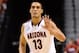 LAS VEGAS, NV - MARCH 15: Nick Johnson #13 of the Arizona Wildcats signals teammates during the championship game of the Pac-12 Basketball Tournament against the UCLA Bruins at the MGM Grand Garden Arena on March 15, 2014 in Las Vegas, Nevada. UCLA won 75-71. (Photo by Ethan Miller/Getty Images)
