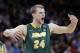 North Dakota State's Taylor Braun encourages fans after his team scored against Oklahoma in the first half of a second-round game of the NCAA men's college basketball tournament in Spokane, Wash., Thursday, March 20, 2014. (AP Photo/Elaine Thompson)