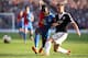 LONDON, ENGLAND - MARCH 08: Yannick Bolasie of Palace tries to get past Luke Shaw of Southampton during the Barclays Premier League match between Crystal Palace and Southampton at Selhurst Park on March 08, 2014 in London, England. (Photo by Charlie Crowhurst/Getty Images)