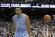 North Carolina's James Michael McAdoo celebrates following a dunk against UNC Wilmington during the second half of an NCAA college basketball game in Chapel Hill, N.C., Tuesday, Dec. 31, 2013. North Carolina won 84-51. (AP Photo/Gerry Broome)