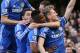 Chelsea's Andre Schuerrle, right celebrates with teammates after scoring his sides second goal during their English Premier League soccer match between Chelsea and Arsenal at Stamford Bridge stadium in London, Saturday, March 22, 2014. (AP Photo/Alastair Grant)