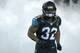 Jacksonville Jaguars running back Maurice Jones-Drew (32) runs onto the field during player introductions prior to an NFL football game against the Houston Texans in Jacksonville, Fla., Thursday, Dec. 5, 2013.(AP Photo/Phelan M. Ebenhack)