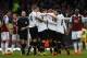 Manchester United's Wayne Rooney, center left, celebrates his goal against West Ham United with teammates during their English Premier League soccer match at Upton Park, London, Saturday, March 22, 2014. (AP Photo/Sang Tan)