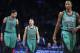 Boston Celtics guard Phil Pressey (26), center Jared Sullinger (7), and forward Chris Johnson (12) react as they take the court during the second half of an NBA basketball game against the Brooklyn Nets at the Barclays Center, Friday, March 21, 2014, in New York. The Nets defeated the Celtics, 114-98. (AP Photo/John Minchillo)
