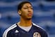 Mar 19, 2014; New Orleans, LA, USA; New Orleans Pelicans forward Anthony Davis (23) sits out of the game against the Toronto Raptors at the Smoothie King Center. Mandatory Credit: Derick E. Hingle-USA TODAY Sports