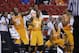 Tennessee's players Jeronne Maymon, Antonio Barton and Josh Richardson, from left, celebrate after the second half of an NCAA college basketball second-round tournament game against Massachusetts, Friday, March 21, 2014, in Raleigh, N.C. Tennessee won 86-67. (AP Photo/Chuck Burton)