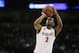 San Diego State’s Xavier Thames (2) takes a free throw during the second-round game of the NCAA men's college basketball tournament against New Mexico State, in Spokane, Wash., Thursday, March 20, 2014. (AP Photo/Young Kwak)