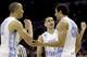 North Carolina's James Michael McAdoo (43) celebrates with teammates Brice Johnson (11), and Marcus Paige (5) after being fouled by Providence in the final seconds of the second half of a second-round game in the NCAA college basketball tournament Friday, March 21, 2014, in San Antonio. McAdoo's free throws lifted North Carolina to a 79-77 win over Providence. (AP Photo/David J. Phillip)