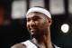 SACRAMENTO, CA - MARCH 18: DeMarcus Cousins #15 of the Sacramento Kings reacts after the play against the Washington Wizards at Sleep Train Arena on March 18, 2014 in Sacramento, California. NOTE TO USER: User expressly acknowledges and agrees that, by downloading and or using this photograph, User is consenting to the terms and conditions of the Getty Images Agreement. Mandatory Copyright Notice: Copyright 2014 NBAE (Photo by Garrett Ellwood/NBAE via Getty Images)