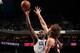 CHARLOTTE, NC - MARCH 22: Al Jefferson #25 of the Charlotte Bobcats shoots against Robin Lopez #42 of the Portland Trail Blazers at the Time Warner Cable Arena on March 22, 2014 in Charlotte, North Carolina. NOTE TO USER: User expressly acknowledges and agrees that, by downloading and or using this photograph, User is consenting to the terms and conditions of the Getty Images License Agreement. Mandatory Copyright Notice: Copyright 2014 NBAE (Photo by Brock Williams-Smith/NBAE via Getty Images)