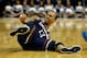 BUFFALO, NY - MARCH 22: Shabazz Napier #13 of the Connecticut Huskies falls down against the Villanova Wildcats during the third round of the 2014 NCAA Men's Basketball Tournament at the First Niagara Center on March 22, 2014 in Buffalo, New York. (Photo by Elsa/Getty Images)