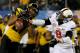ARLINGTON, TX - JANUARY 03: Wide receiver Bud Sasser #21 of the Missouri Tigers is unable to make a catch as it's broken up by Daytawion Lowe #8 of the Oklahoma State Cowboys in the first quarter during the AT&T Cotton Bowl on January 3, 2014 in Arlington, Texas. (Photo by Ronald Martinez/Getty Images)