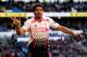CARDIFF, WALES - MARCH 22: Luis Suarez of Liverpool celebrates after scoring hihs third and his team's sixth goal of the game during the Barclays Premier League match between Cardiff City and Liverpool at Cardiff City Stadium on March 22, 2014 in Cardiff, Wales. (Photo by Ben Hoskins/Getty Images)