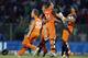 Netherlands' players celebrate their win against Ireland during the ICC Twenty20 Cricket World Cup match in Sylhet, Bangladesh, Friday, March 21, 2014. (AP Photo/A.M. Ahad)