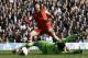 Southampton's Adam Lallana scores a goal past Tottenham's Hugo Lloris during the English Premier League soccer match between Tottenham Hotspur and Southampton at White Hart Lane stadium in London, Sunday, March 23, 2014. (AP Photo/Kirsty Wigglesworth)