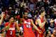 BUFFALO, NY - MARCH 22: Devon Scott #40 and Kyle Davis #3 of the Dayton Flyers react on the bench during the third round of the 2014 NCAA Men's Basketball Tournament against the Syracuse Orange at the First Niagara Center on March 22, 2014 in Buffalo, New York. (Photo by Elsa/Getty Images)